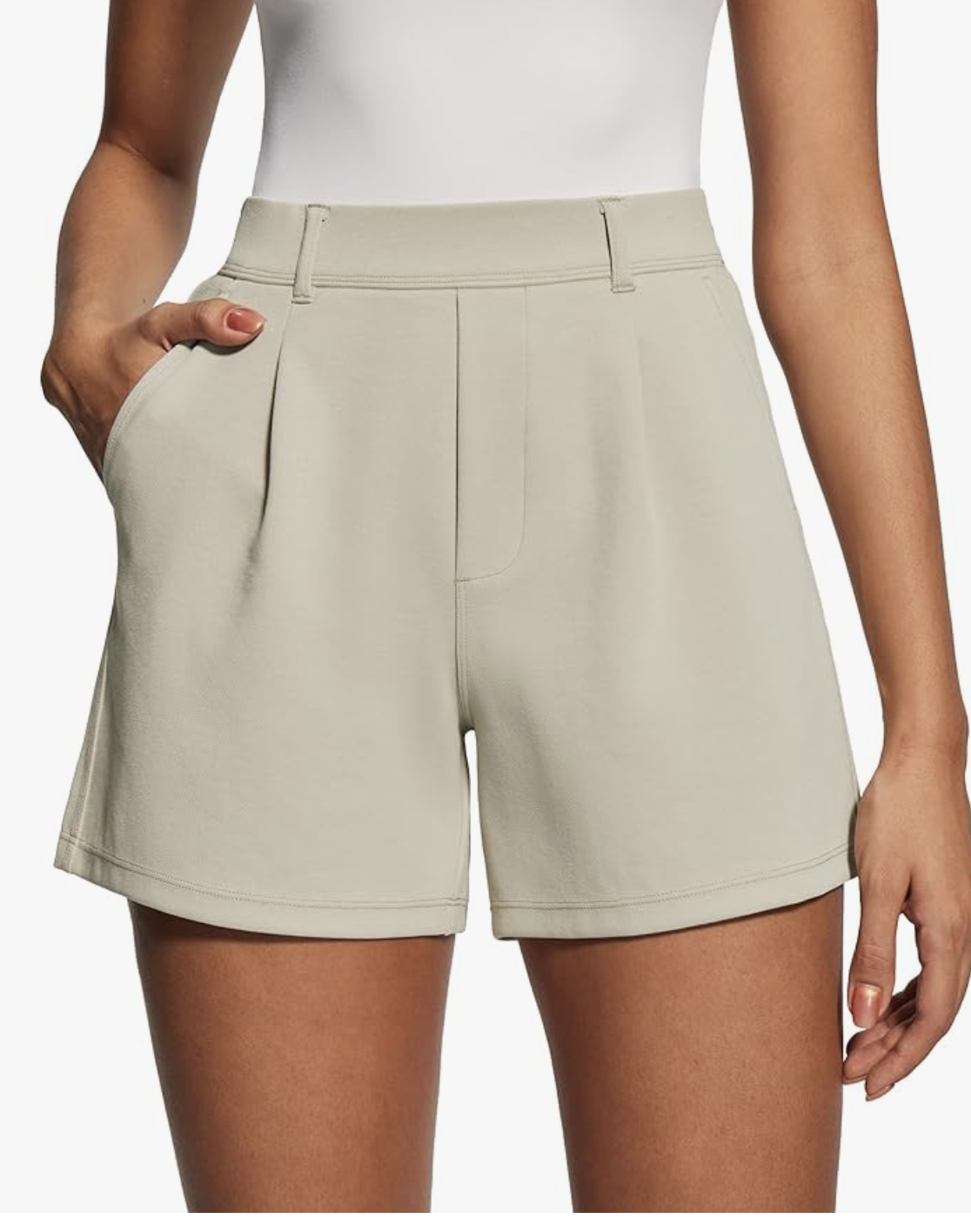 A pair of khaki high-waisted trouser-style Bermuda shorts from Amazon, styled with a bodysuit to balance the midsection and create an airy, elongated silhouette for a big belly.