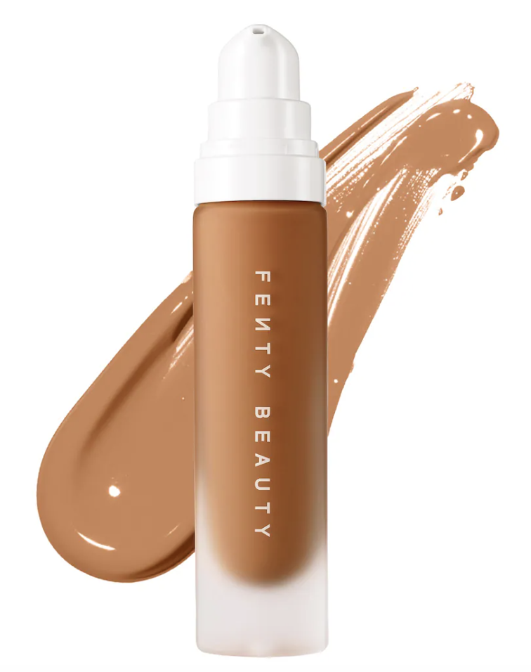 "Fenty Beauty Pro Filt’r Soft Matte Longwear Foundation bottle with a smooth droplet of product, showcasing an inclusive shade range for deep skin tones with a blurred finish."