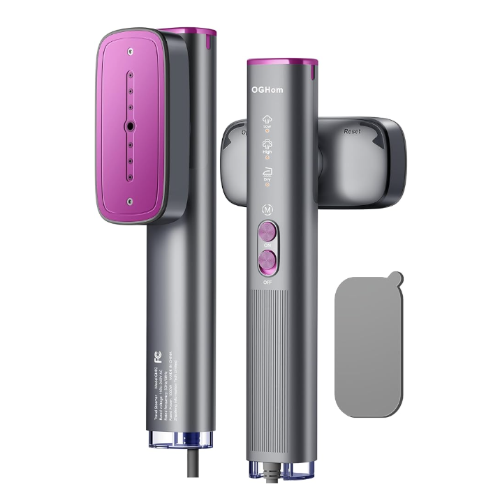 Compact pink handheld garment steamer with attachments.