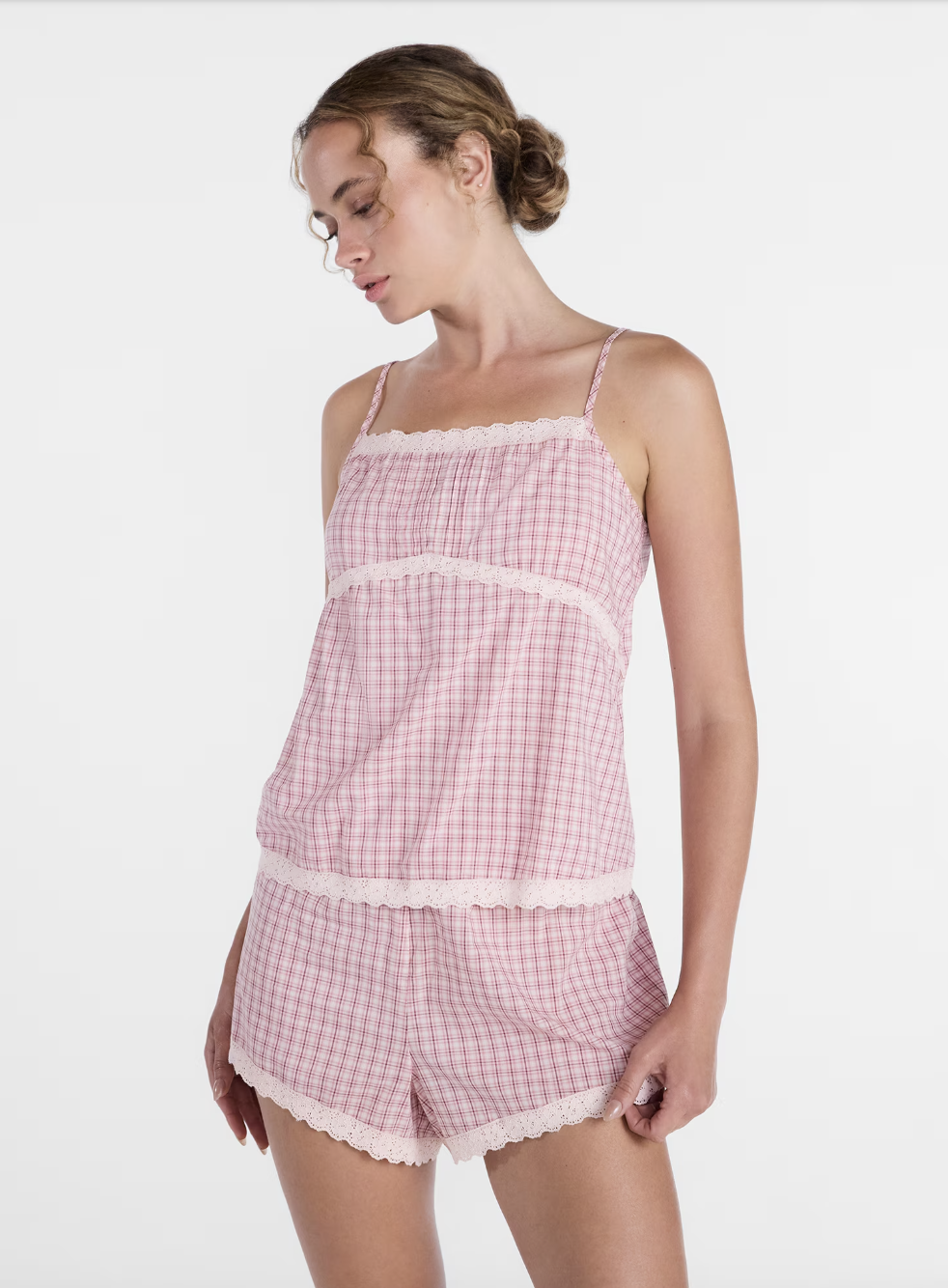 A sleek, minimal short-sleeve cami top designed for clean everyday layering.