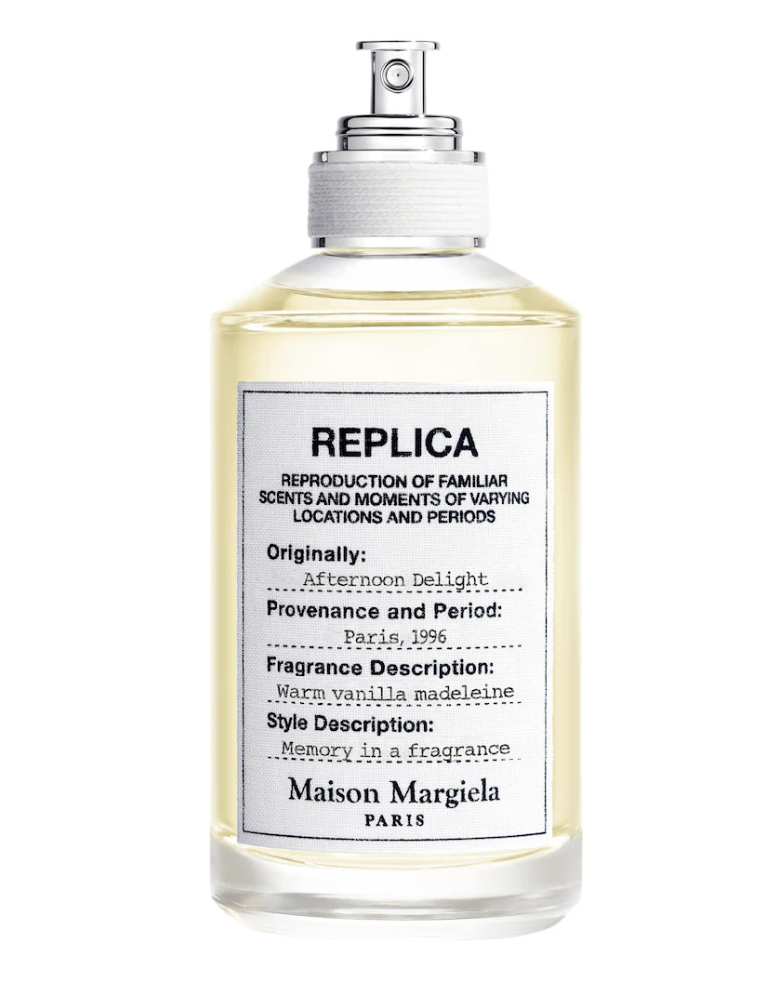 Maison Margiela Replica Afternoon Delight perfume bottle label featuring notes of warm vanilla madeleine and sandalwood.
