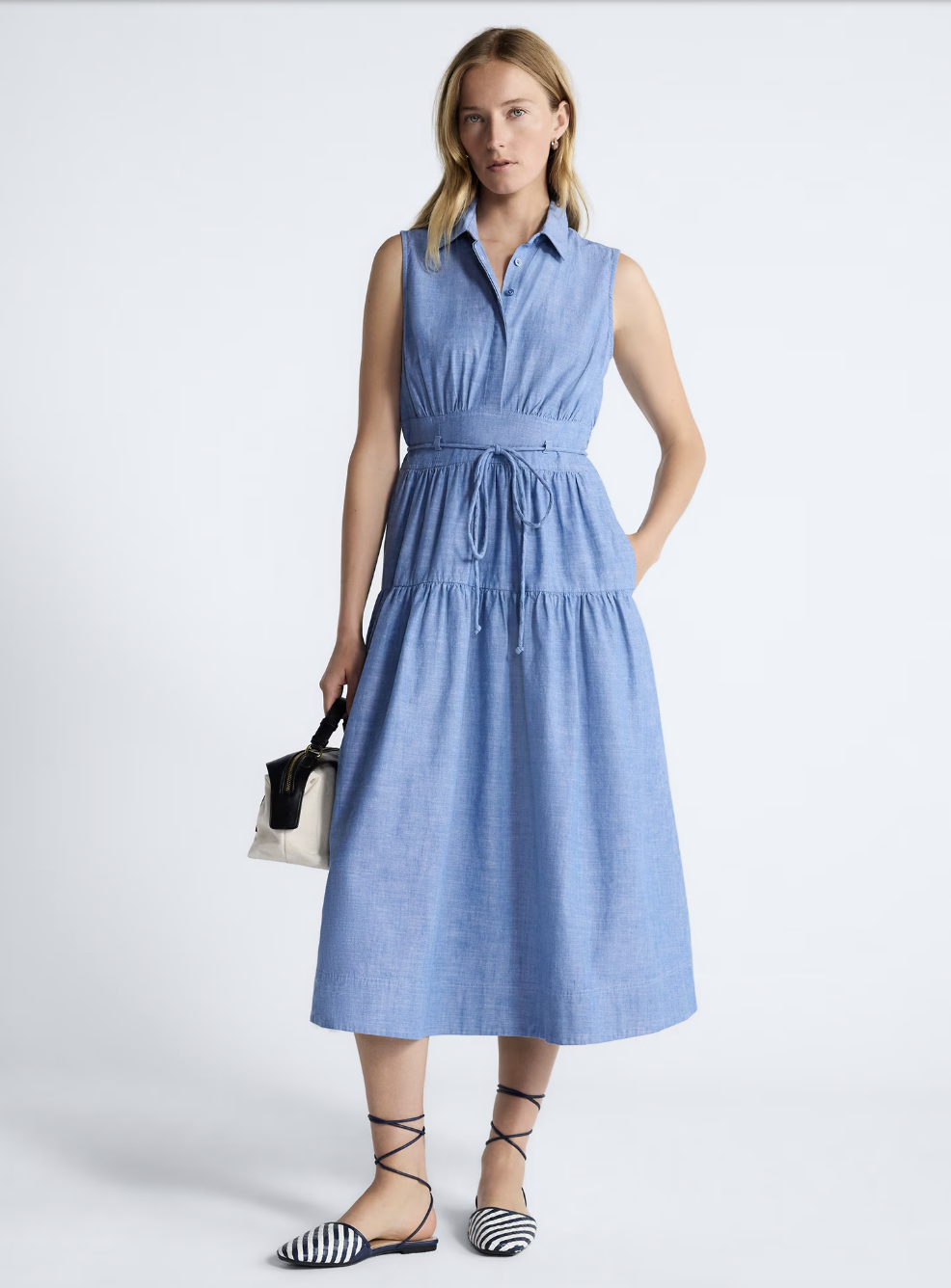 A flowy sleeveless cotton maxi dress perfect for hot weather styling.