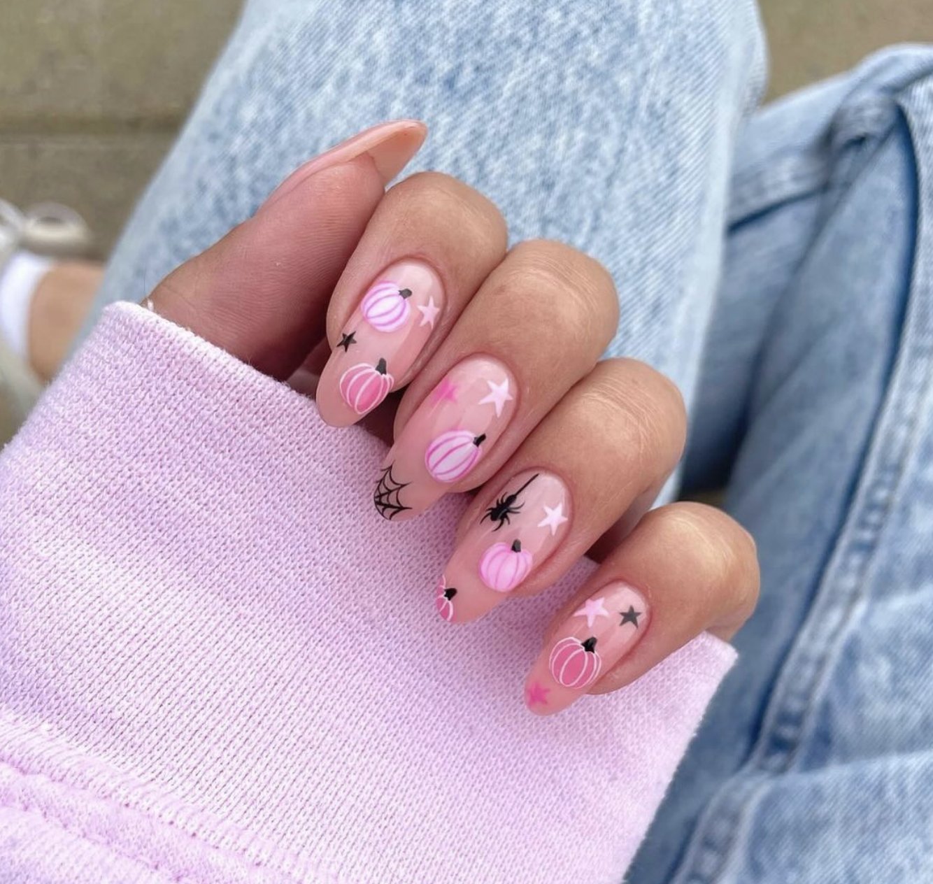 Dusty-pink pumpkin nail art with chocolate-brown stems