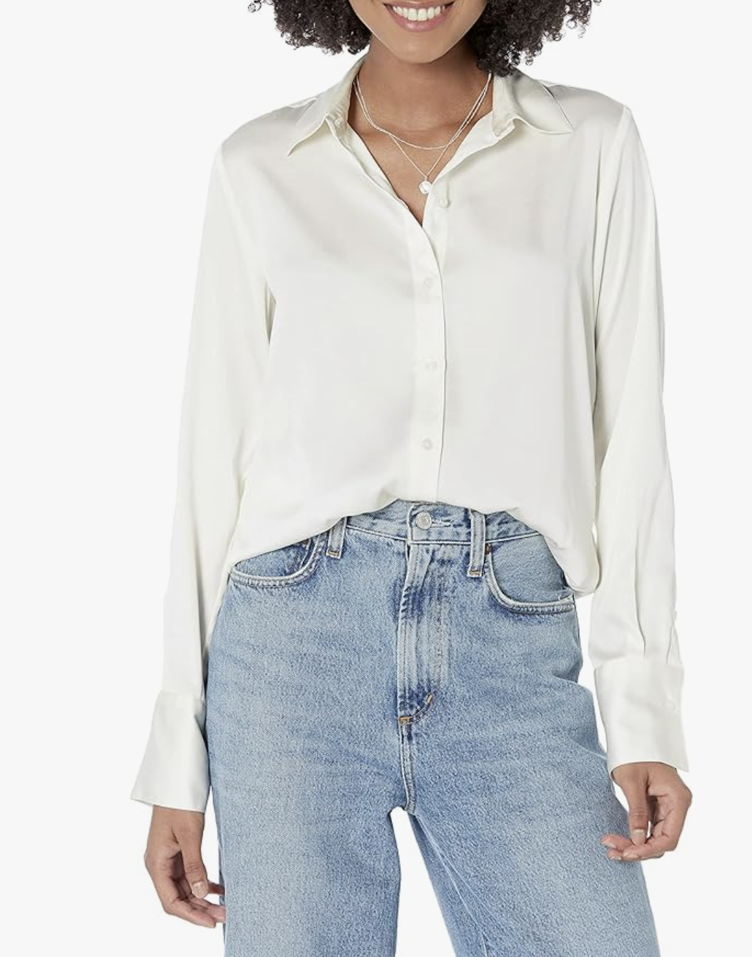 Close-up of a white Satin Button Down Blouse featuring a classic collar and long sleeves, paired with denim for a sophisticated and clean look.