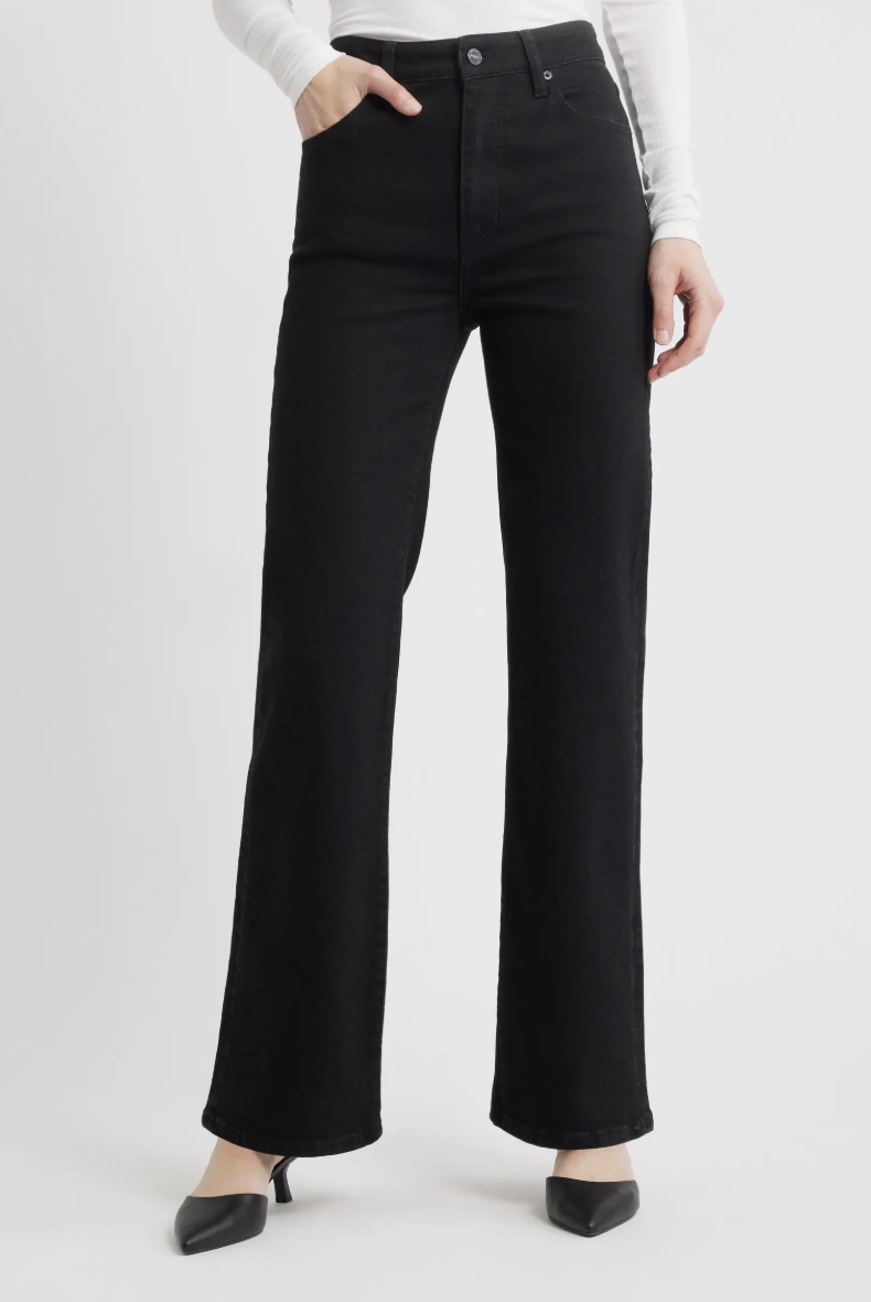 Product view of black FRAME The Arrow high-waist relaxed bootcut jeans with a slight flare and pointed-toe kitten heels.
