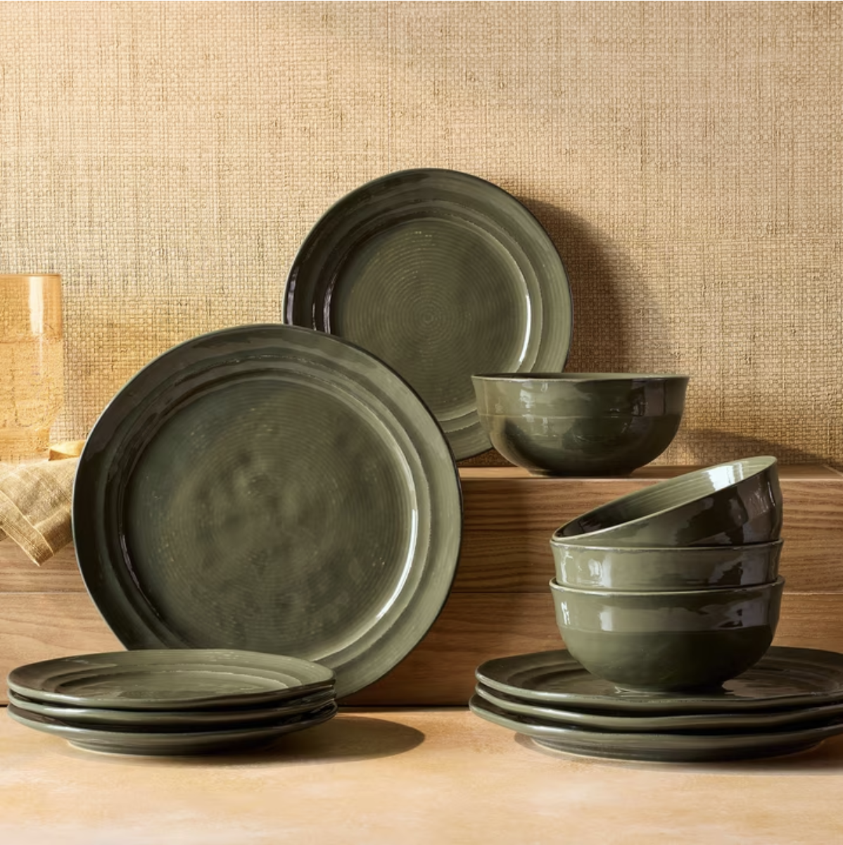 Friendsgiving table styled with warm brown, muted green, cream and rust accents
