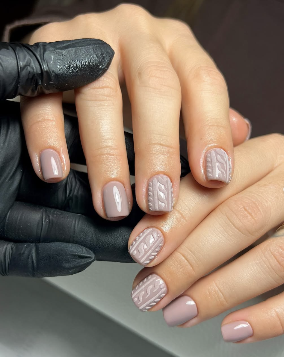 September nail idea featuring cream cable-knit art