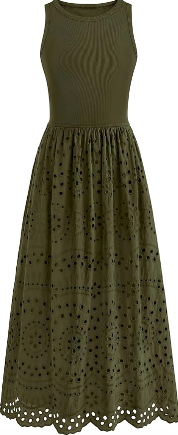 Woman wearing a forest green sleeveless eyelet cotton maxi dress with a tiered skirt and tank-style bodice.