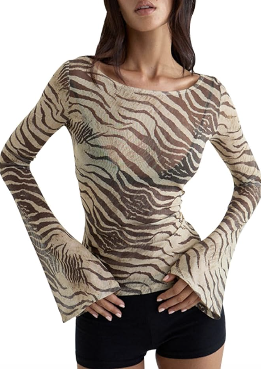 A person wearing a brown and black zebra print sheer mesh long-sleeve top with flared sleeves and a high neckline.