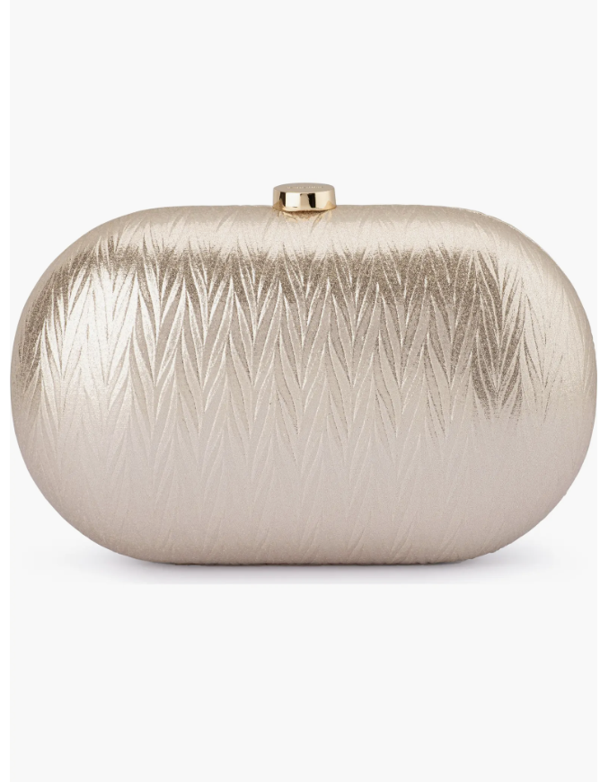 A small, structured oval hard-case clutch bag in a metallic champagne gold finish, featuring an elegant etched chevron or leaf-like texture and a small gold top clasp.