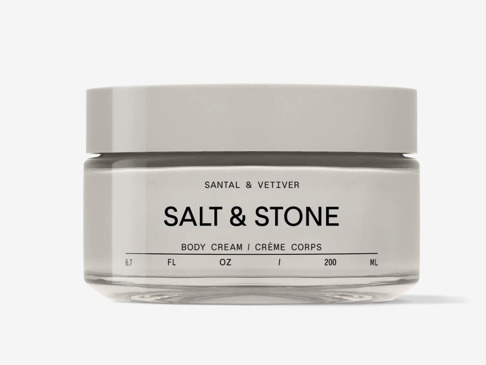 Salt & Stone Body Cream in minimalist packaging with a dark wood accent.”