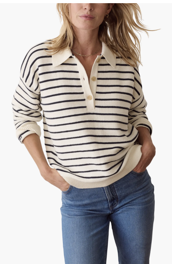Striped knit polo styled with dark denim and chocolate loafers for a modern fall outfit over 60.