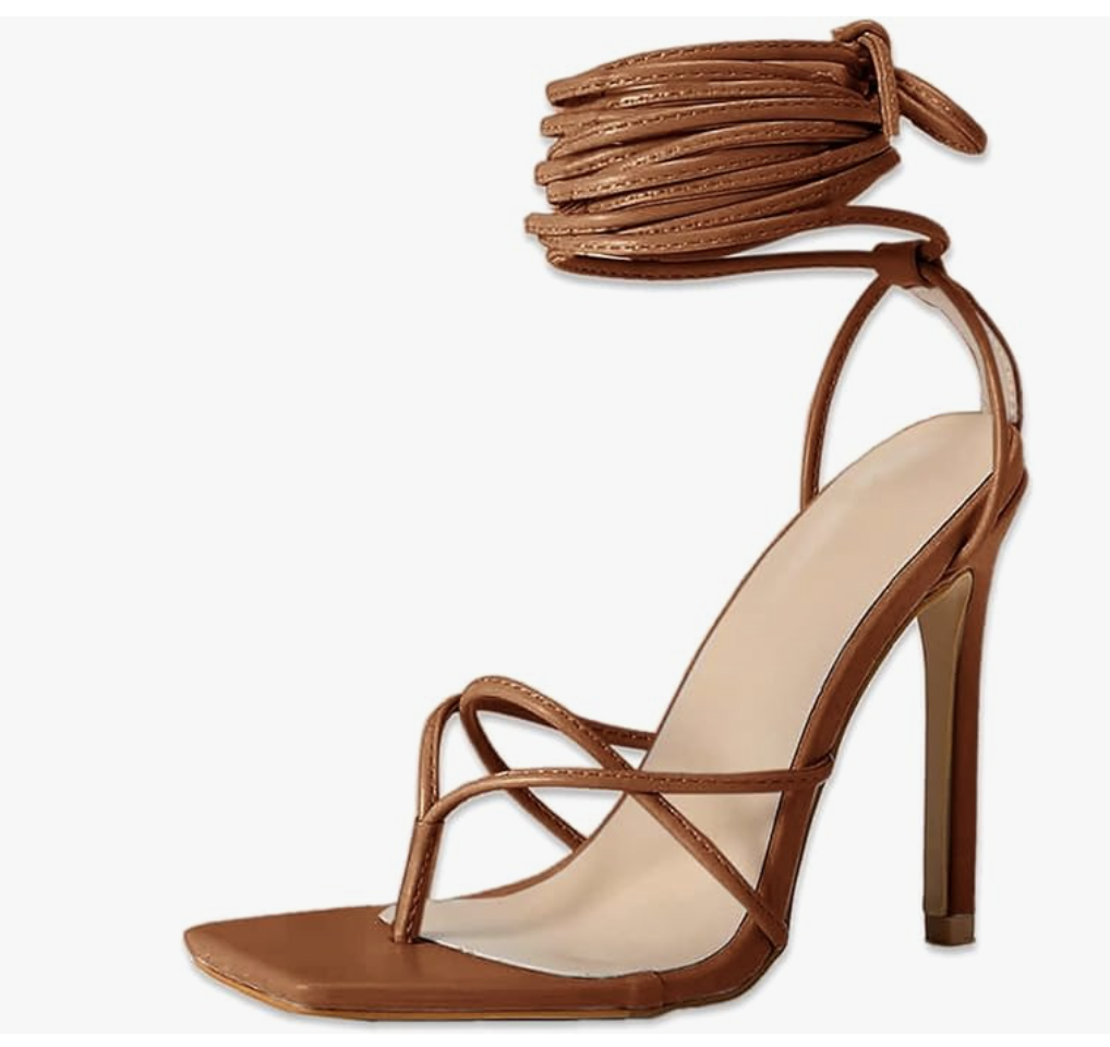 A pair of tan faux-leather lace-up sandals with a high stiletto heel and long ties to wrap around the ankle.