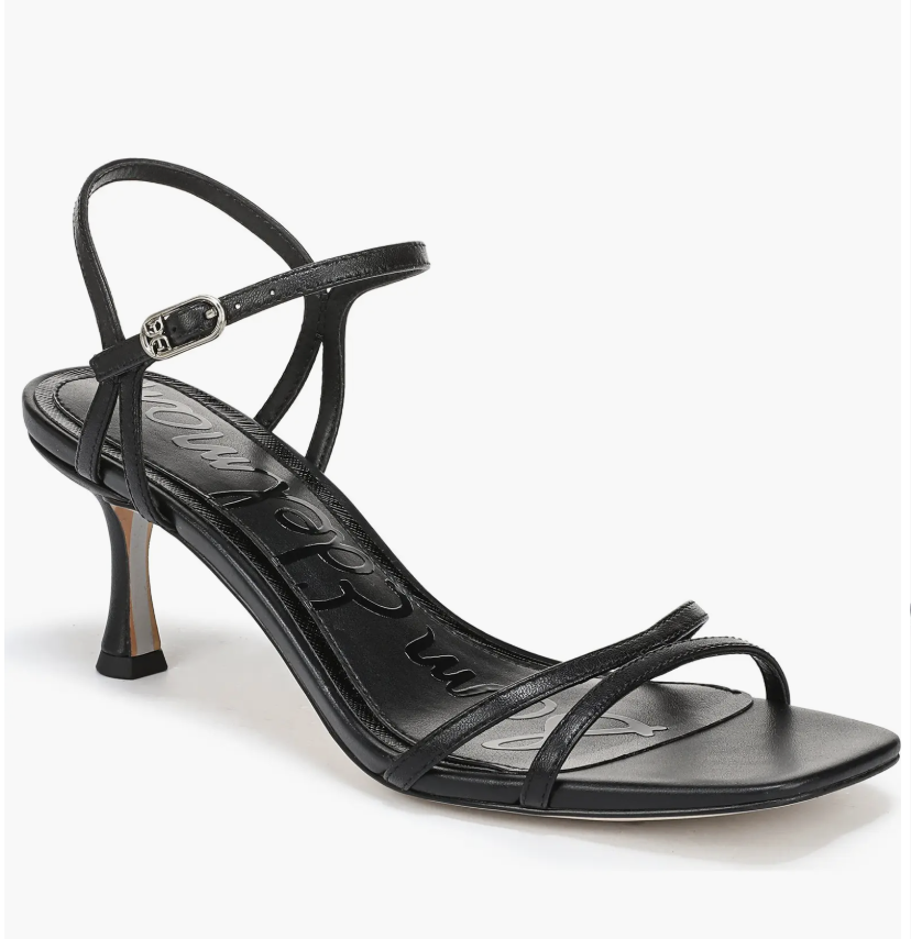 A pair of black minimalist high-heel sandals with a trendy square toe and two thin straps.