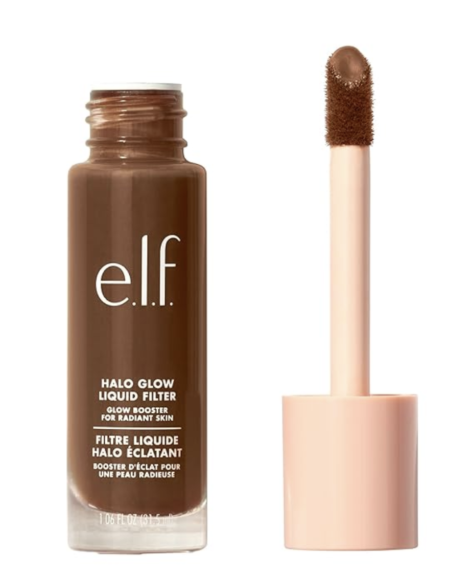 A product shot of the e.l.f. Halo Glow Liquid Filter bottle next to its large doefoot applicator wand, showcasing the luminous liquid formula against a clean, neutral background.