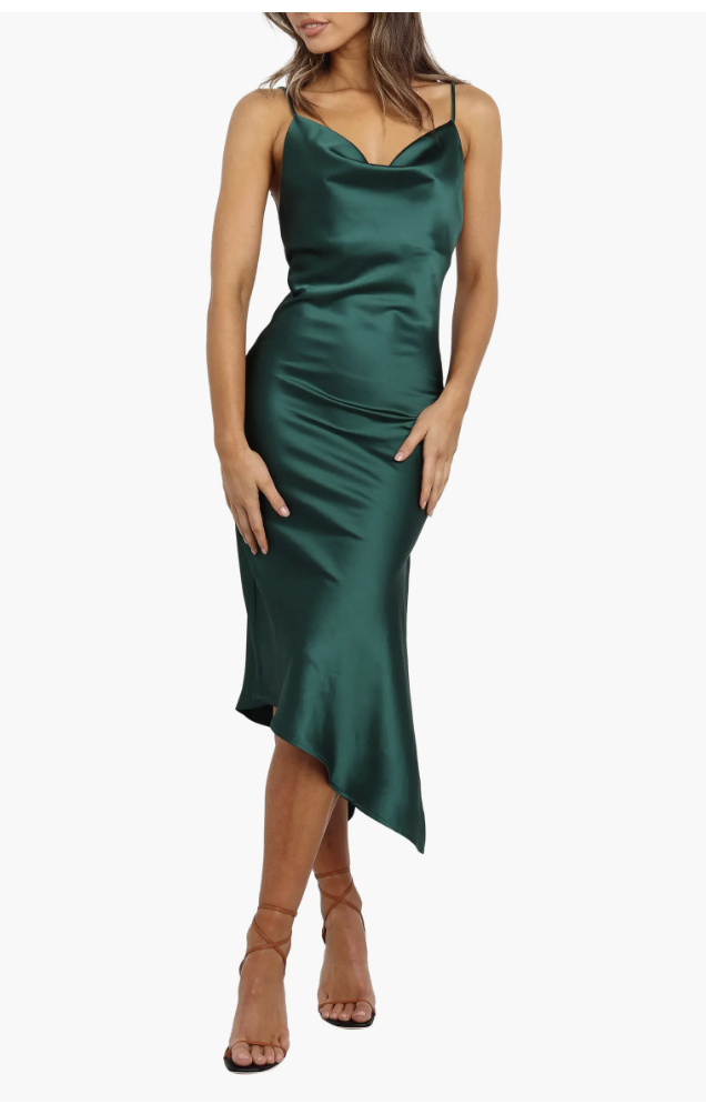 Petal and Pup Cyprus emerald green satin cowl-neck slip dress with an asymmetrical hemline and strappy heels