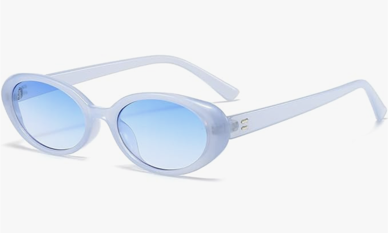 A pair of retro-style oval sunglasses with light blue translucent frames and matching blue tinted lenses on a white background.