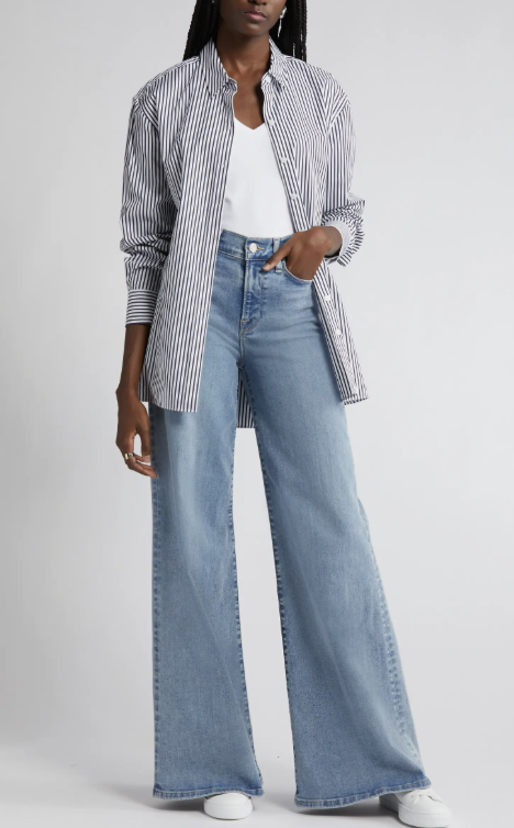 A product shot of the Adidas Handball Spezial sneakers in a leopard print pony hair texture with black laces. These shoes are recommended as the "undone" finishing touch for styling a modern power suit set.