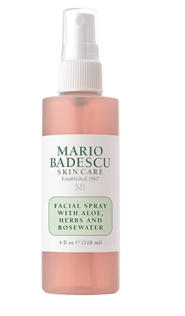A bottle of Mario Badescu Facial Spray with Aloe, Herbs, and Rose Water on a transparent background.