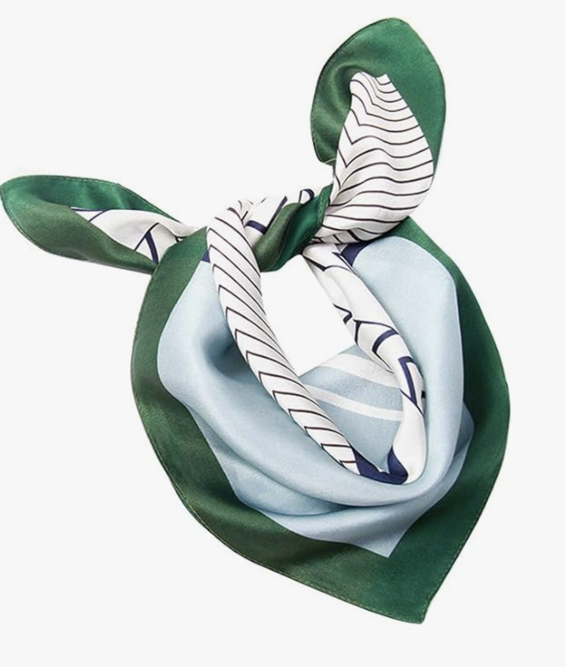 A close-up of a luxury 100% mulberry silk square scarf with a green border and a white-and-black wavy patterned center, styled as a sophisticated accessory for a 50 plus spring wardrobe.