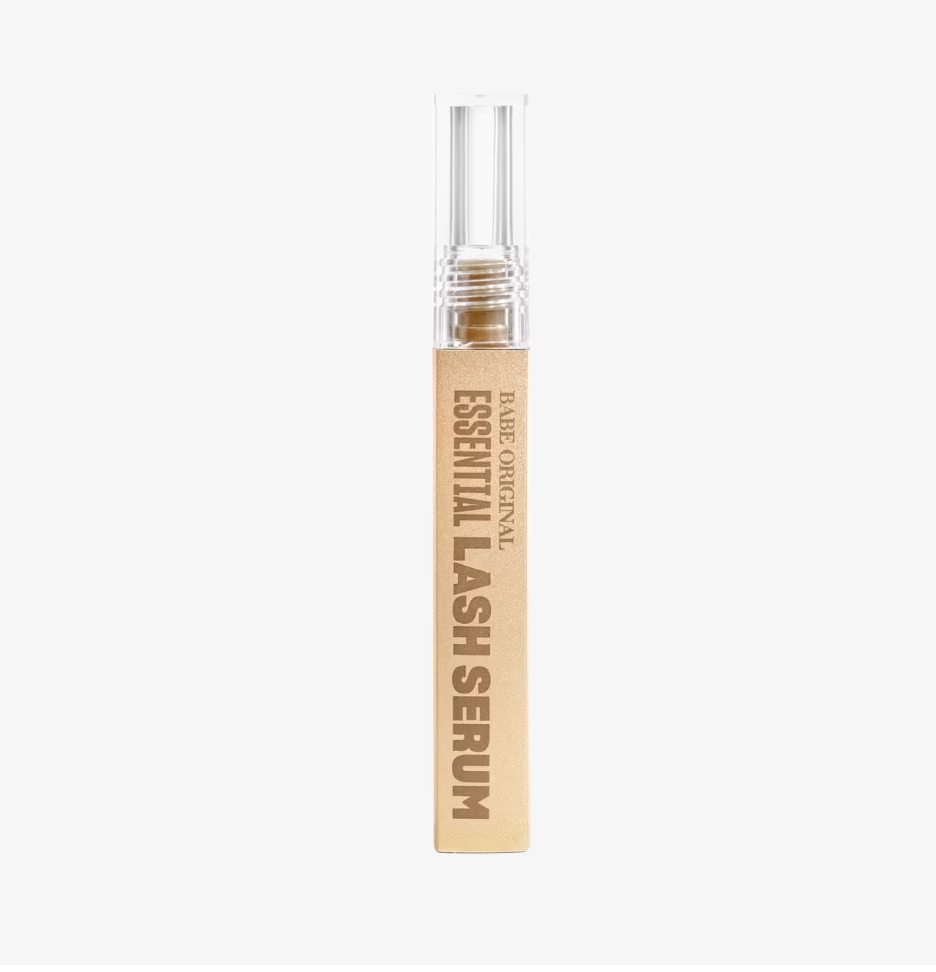 A bottle of Babe Original Essential Lash Serum, an effective lash extension damage recovery treatment to grow lashes naturally during a 5-minute morning routine.
