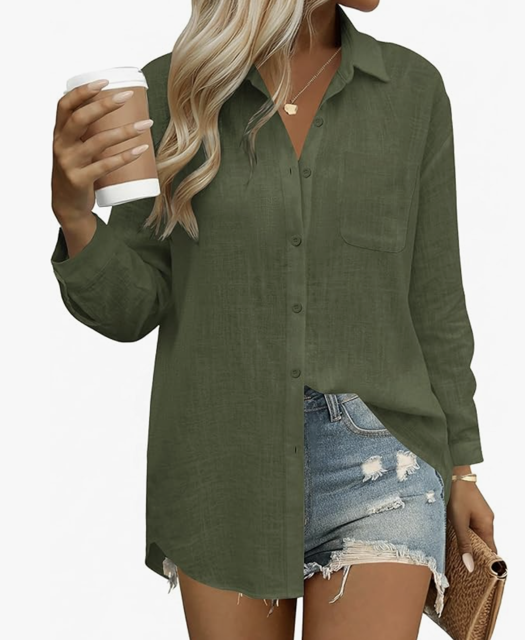A woman wearing an army green linen button-down blouse with denim shorts, styled as a breathable daytime outfit for a cruise.