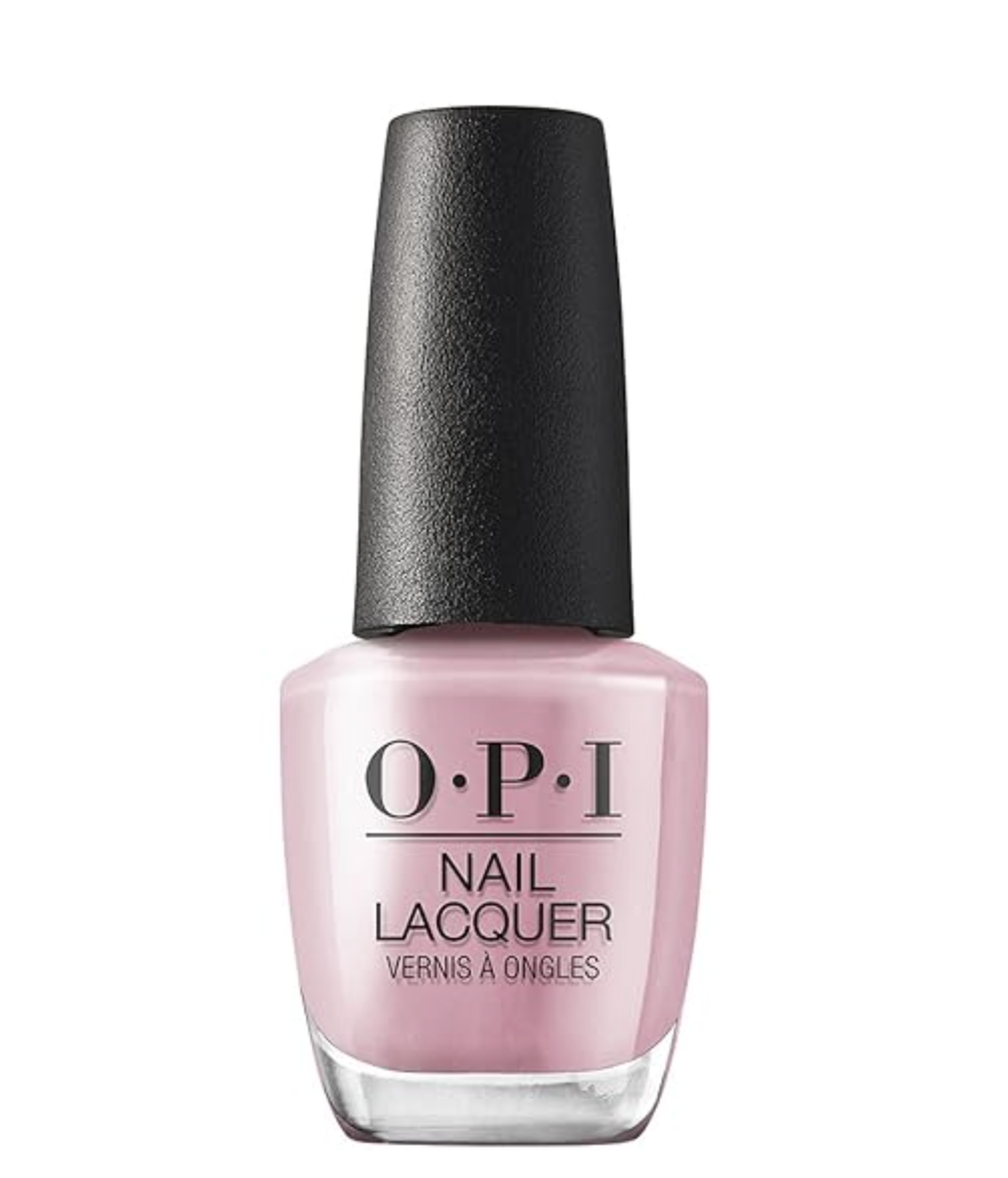 A bottle of OPI (P) Ink on Canvas, an opaque light pink nail polish perfect for a summer manicure.