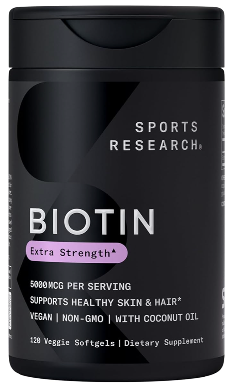 A front-facing product shot of a black bottle of Sports Research Biotin Extra Strength dietary supplement, highlighting 5000mcg per serving in 120 veggie softgels formulated with coconut oil.