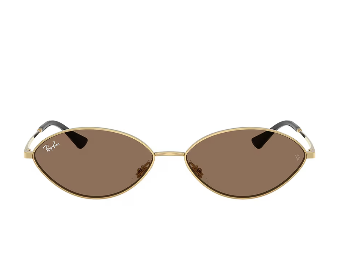 Ray-Ban Kai oval sunglasses in gold metal with brown lenses, a key style for the 2026 slim eyewear trend.
