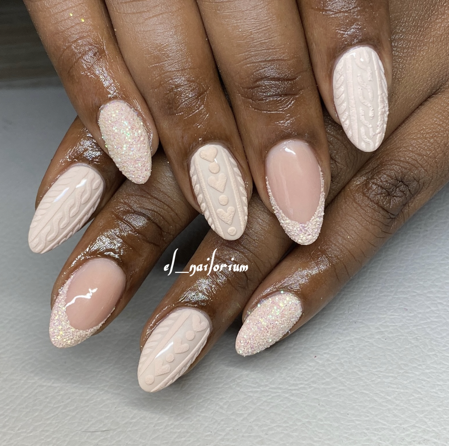 Short winter nails with raised knit sweater nail art