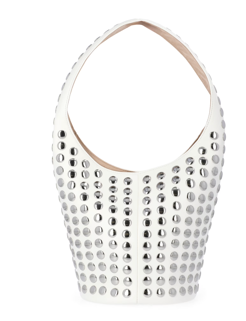 A white faux-leather bucket-style shoulder bag featuring rows of polished silver-tone circular studs and a matching white top handle.