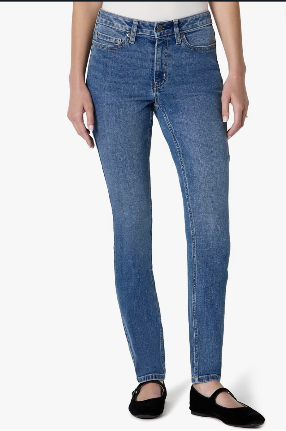 Medium-blue Amazon Essentials mid-rise skinny jeans with a five-pocket design.