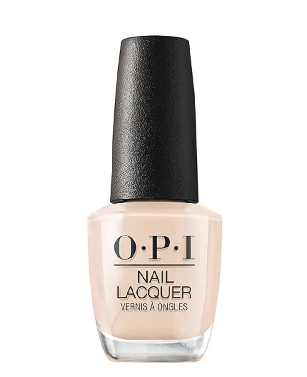 A bottle of OPI Samoan Sand, a warm beige-nude nail polish with a cream finish.