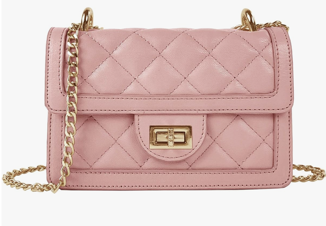 A small, dusty pink quilted faux leather crossbody bag with a gold rectangular turn-lock clasp and a gold chain-link shoulder strap.