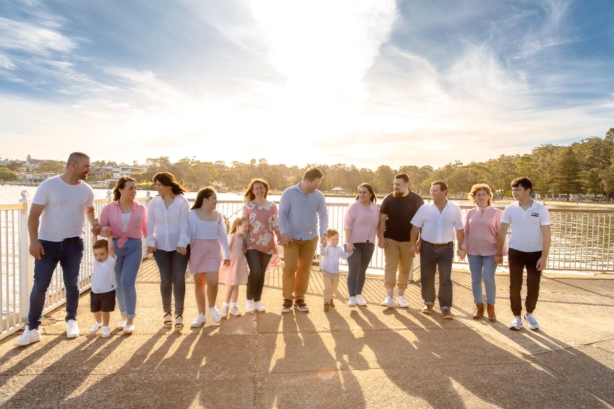 Extended family walking in gorgeous afternoon sun