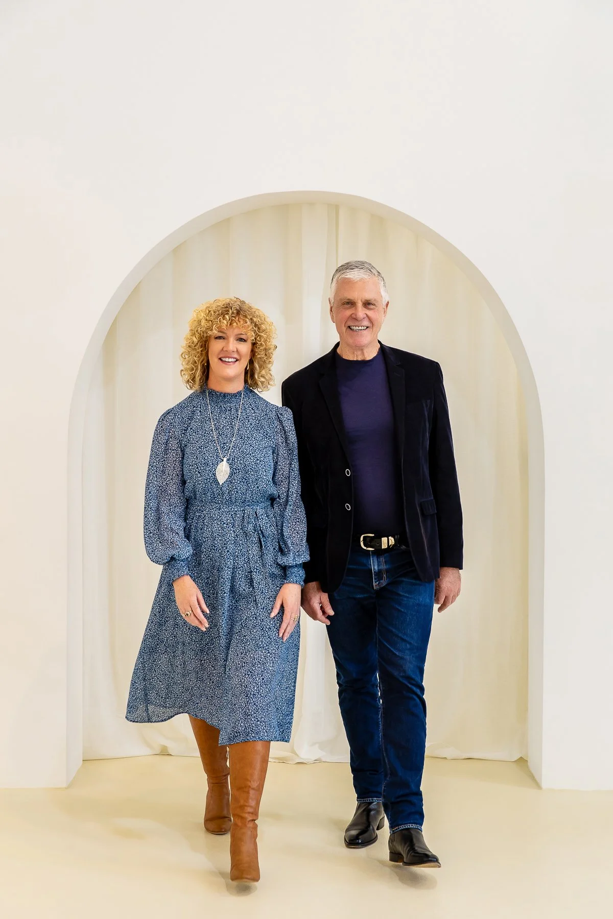 Using the arch wall for walking shots during a brand photography session in Solis Studios