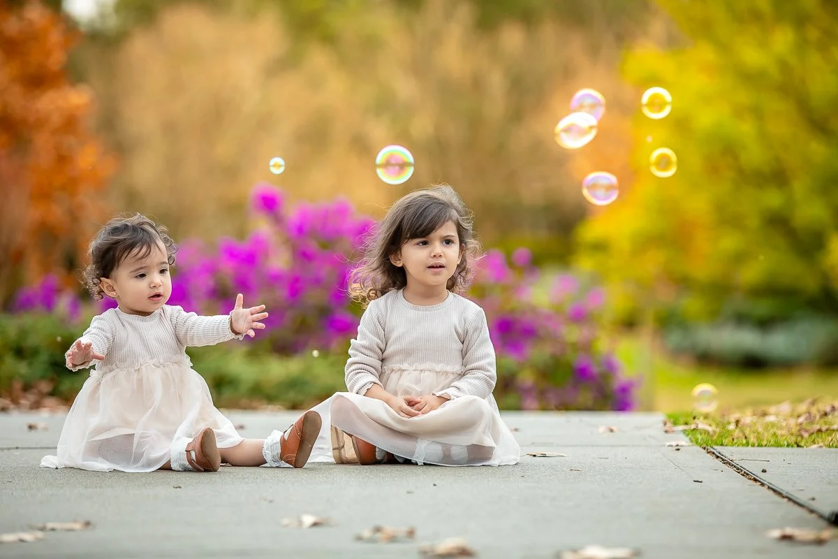 A family at Nurragingy Reserve in Sydney's Western Suburbs for a family photoshoot during the stunning colours of autumn