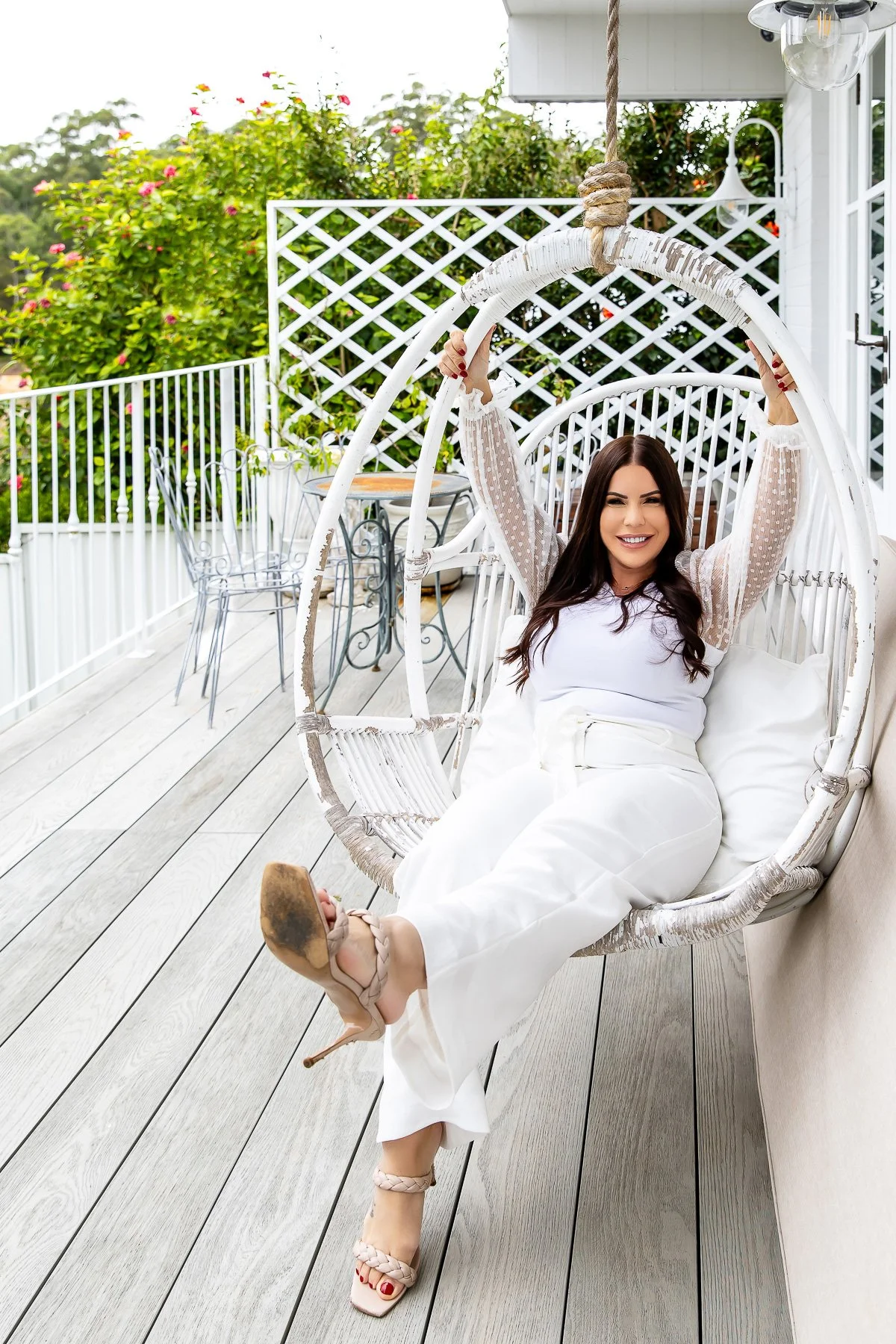 In a swing chair during a Branding shoot at Summerhope House