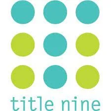 Title Nine logo with turquoise and green dots.