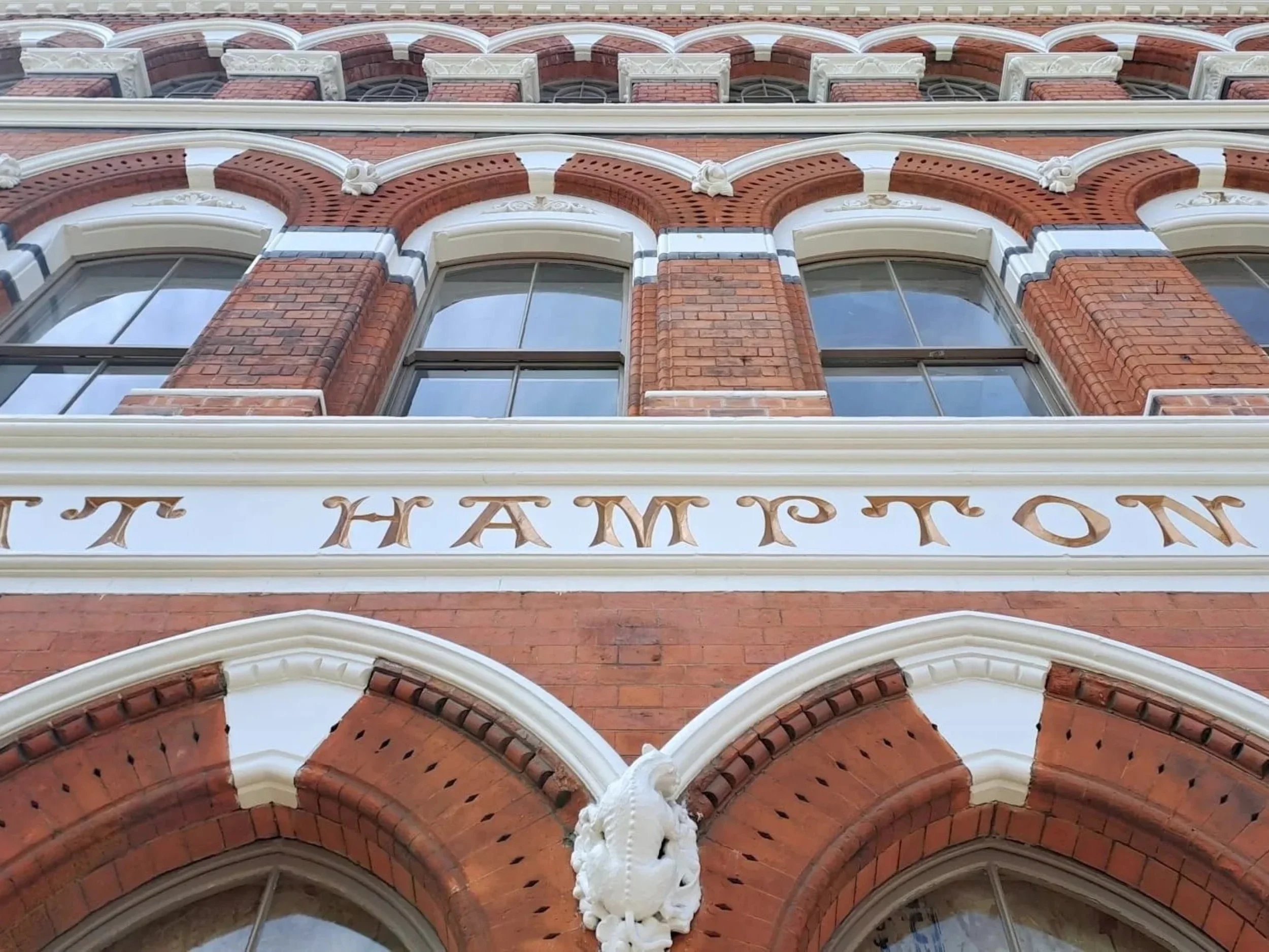 Victorian button factory transformed into a 29-apartment building. Interior design by San Stae.