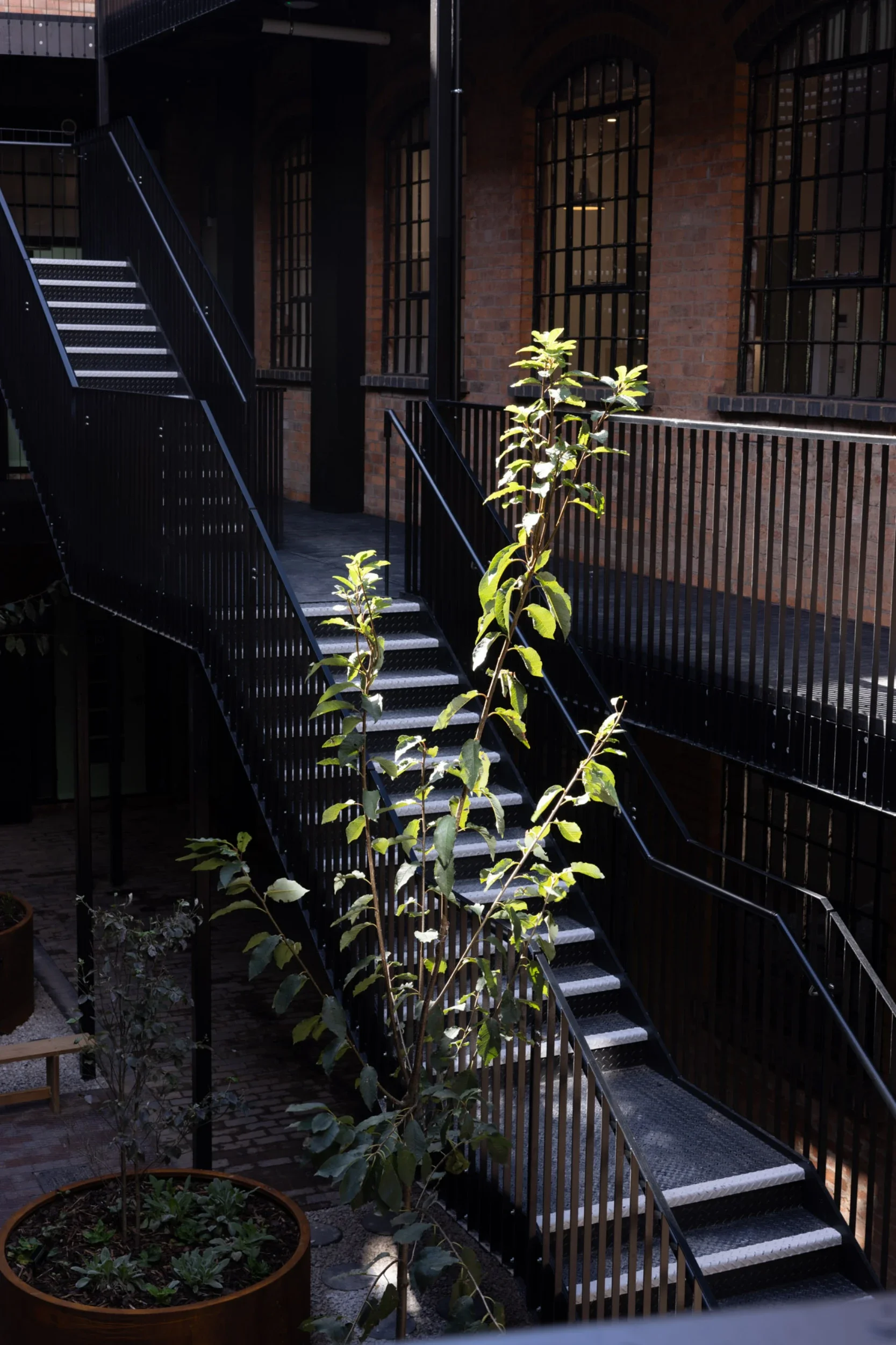 Victorian button factory transformed into a 29-apartment building. Interior design by San Stae.