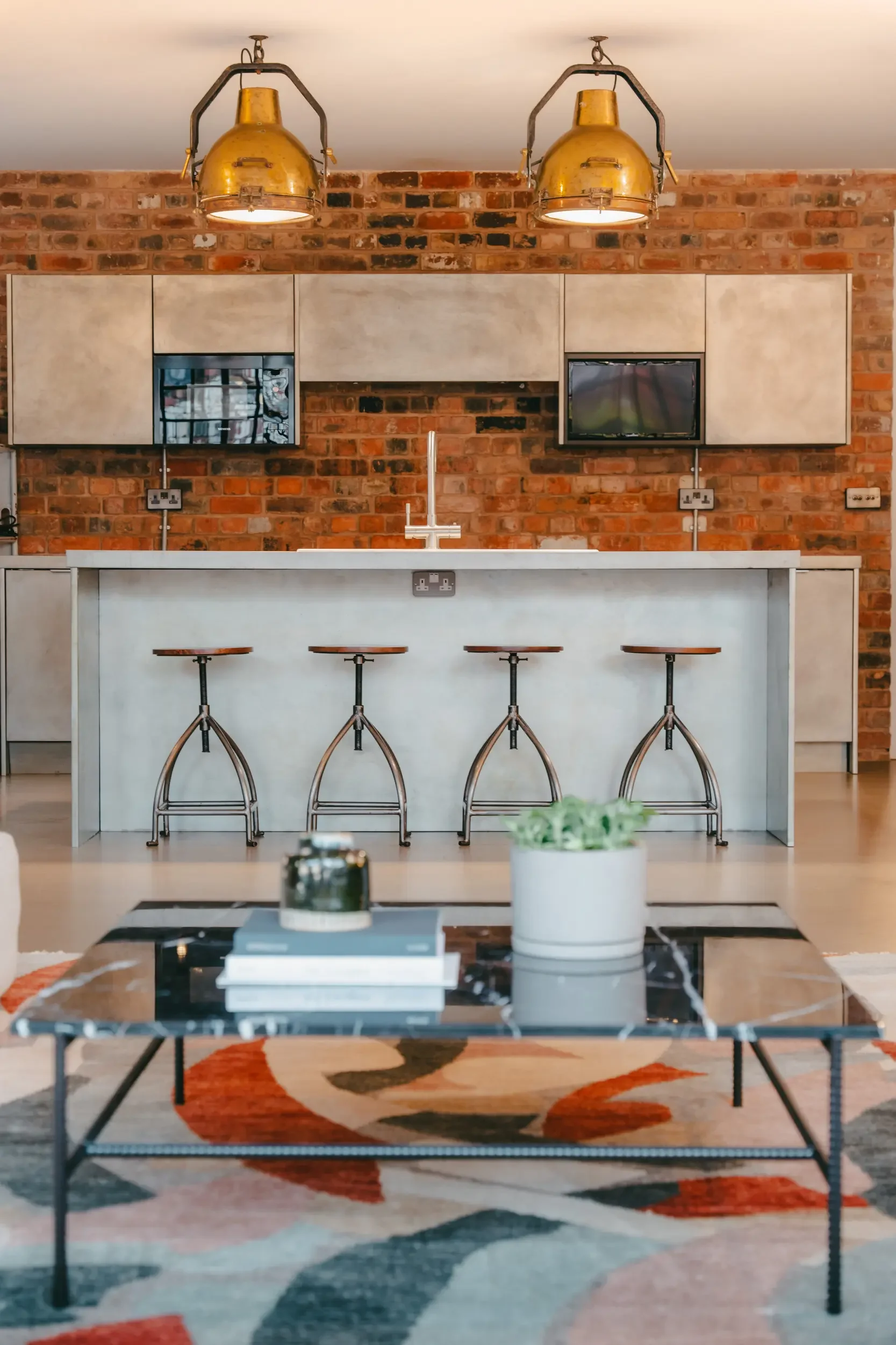 Renovated loft apartment located in the Jewellery Quarter in Birmingham. Designed by San Stae Interior Design and Art Studio.