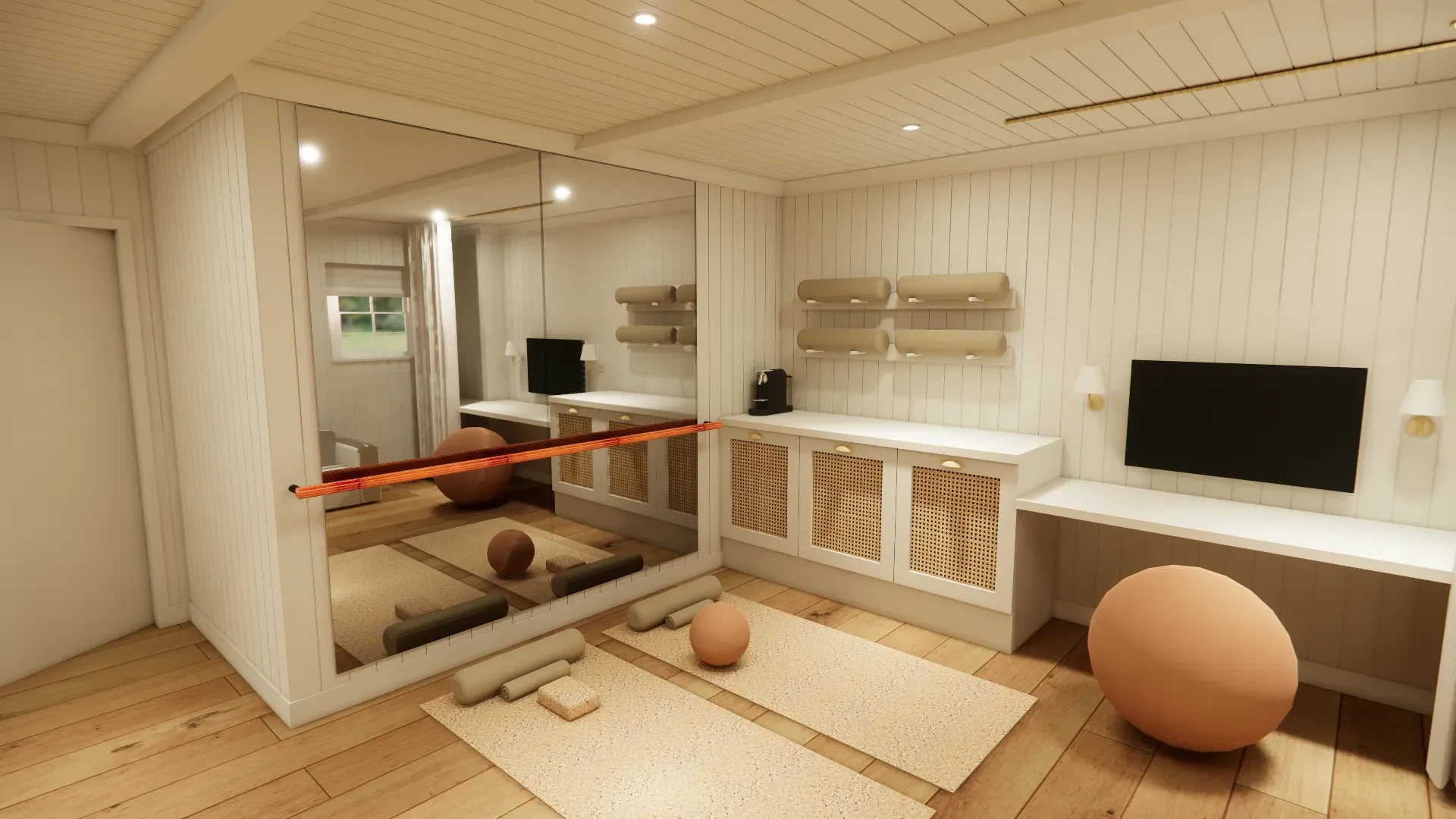 Interior of a room with wood-paneled white walls and ceiling, featuring a large mirror, a wall-mounted flat-screen TV, and built-in cabinets. The room has seating, decor shaped like balls, and exercise mats on the wooden floor.