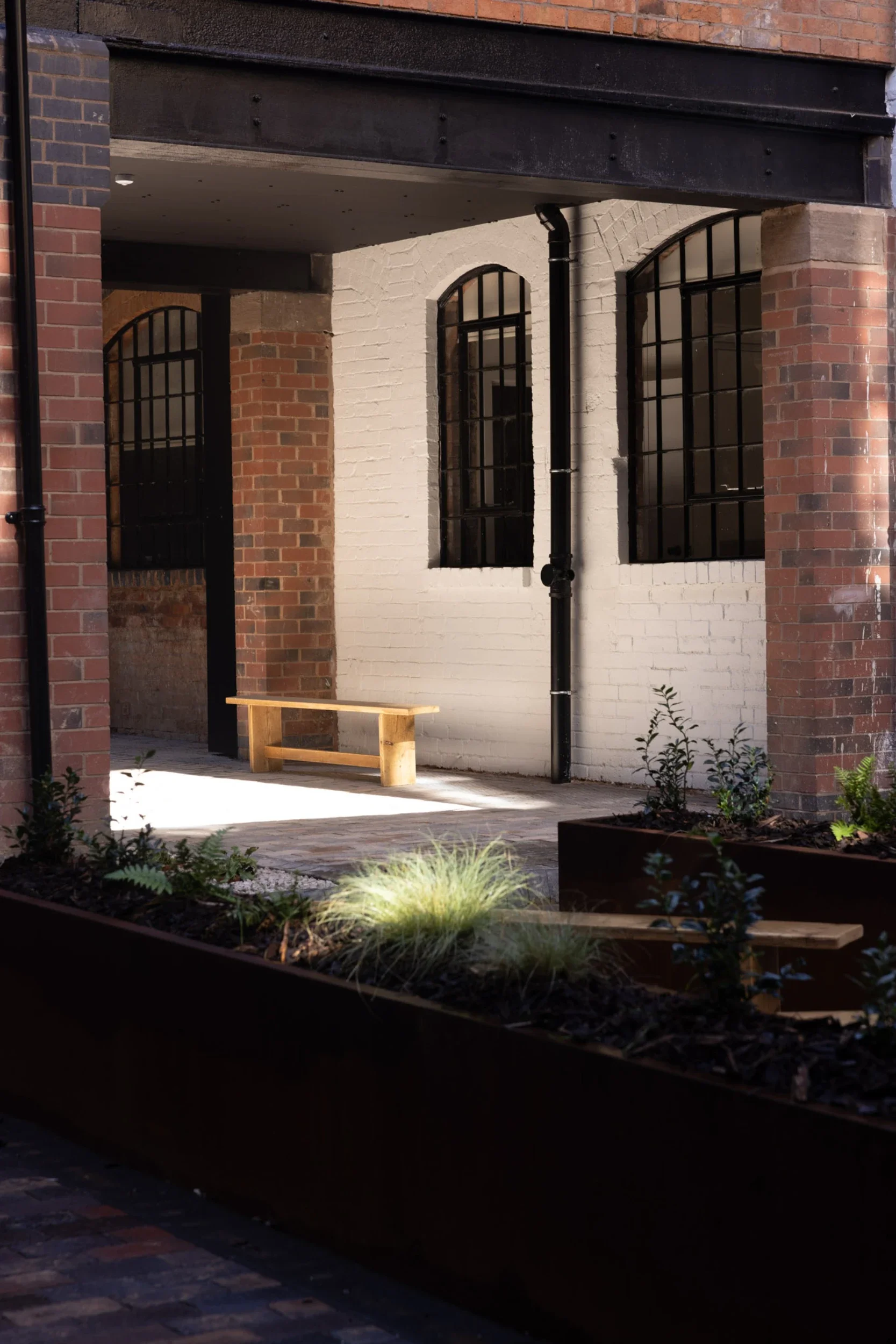 Victorian button factory transformed into a 29-apartment building. Interior design by San Stae.