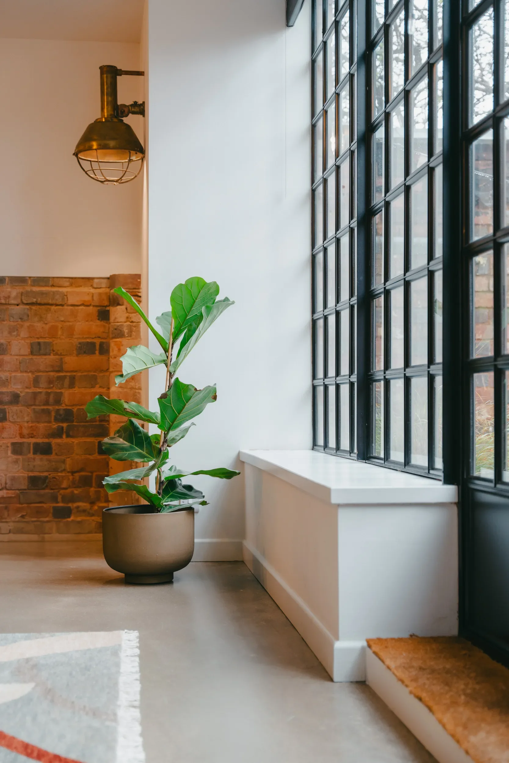 Renovated loft apartment located in the Jewellery Quarter in Birmingham. Designed by San Stae Interior Design and Art Studio.