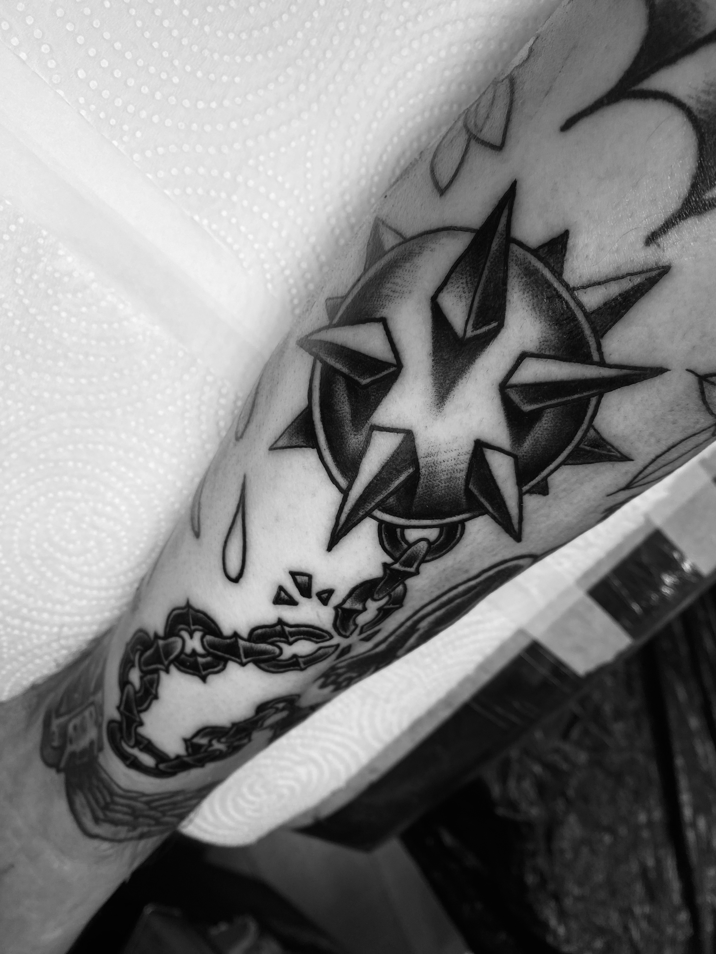 american traditional flail spike ball done by kim bale tattoos at banjaxed ink irelands best tattoo studio