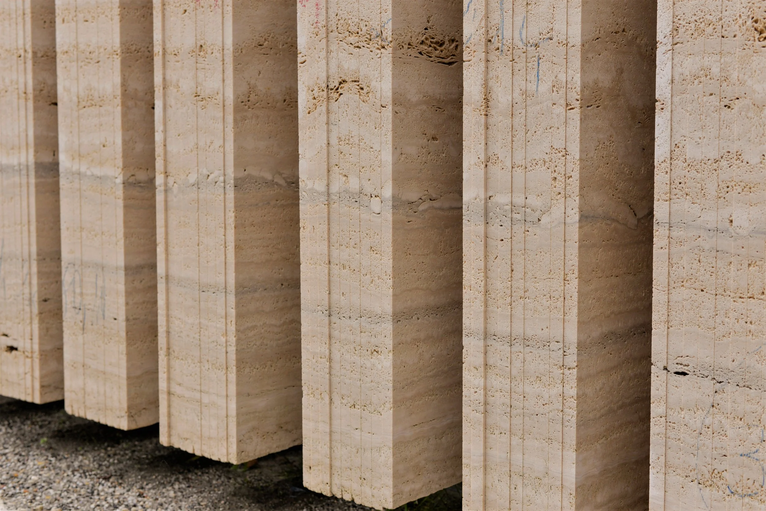 Travertine slabs showing natural beige veining