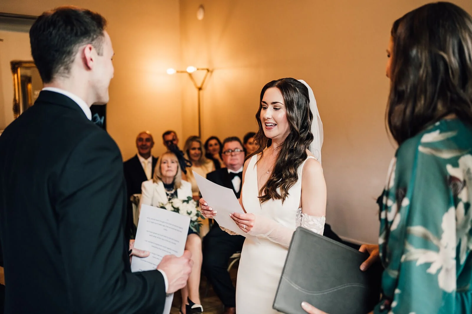 A bride and groom share their wedding vows with Michelle Park at The Faversham in Leeds, West Yorkshire