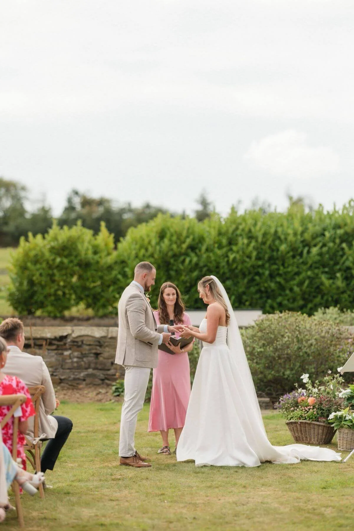 Michelle Park Celebrant stands with a bride and groom in North Yorkshire, conducting a celebrant wedding