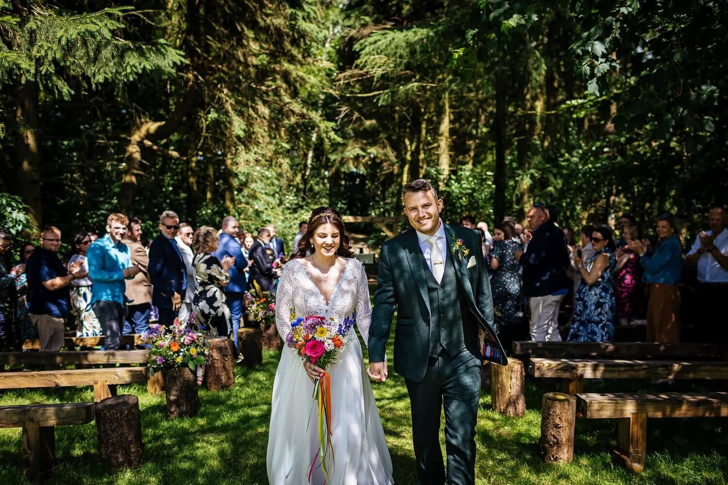 A bride and groom smile after their celebrant wedding with Michelle Park Celebrant in Leeds, West Yorkshire